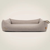 Orthopädisches Hundebett von Rudelkönig in Polsterstoff grau beige.
